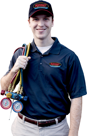 image of heatcraft certified contractor with pressure measurement gauge