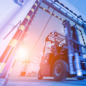 image of warehouse with forklift representing Cold Storage